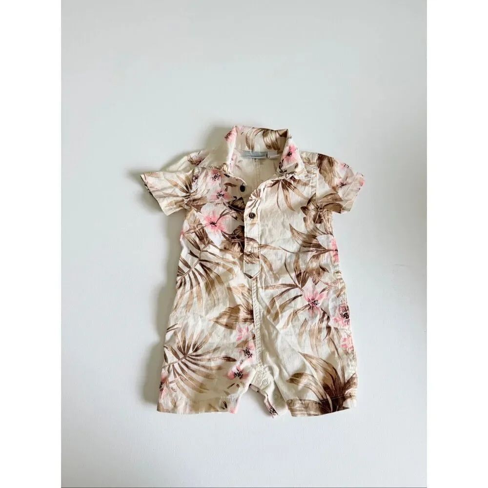 Children's Place tropical textured romper with a button front and snap closures